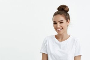 woman in white smiling