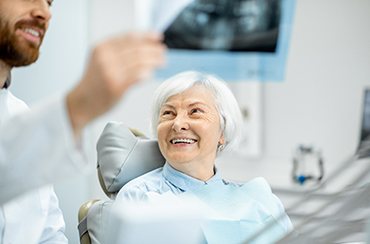 patient talking to dentist 