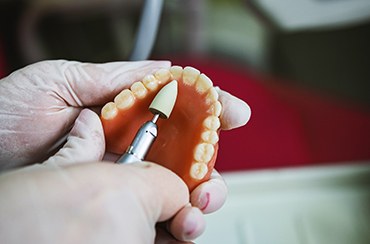 Adjusting the teeth on dentures in East Longmeadow, MA