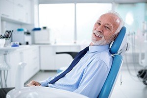 man with tie on smiling