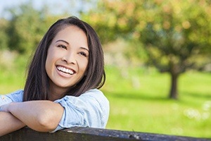 woman laughing outside