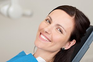 woman blue smock on smiling