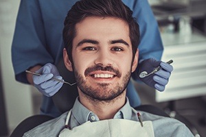 man with beard smiling