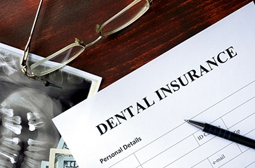 Dental insurance paperwork for the cost of dental implants