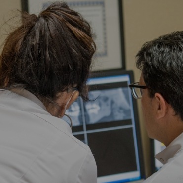 Dentist working on digital x-rays