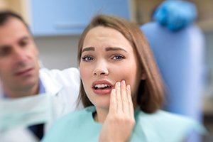 woman with a dental emergency