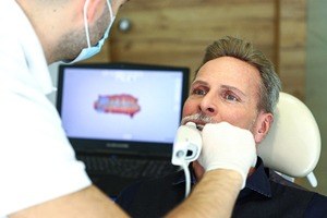 man having teeth digitally impressed