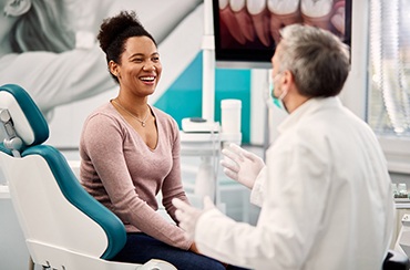 woman visiting with the dentist on a regular basis