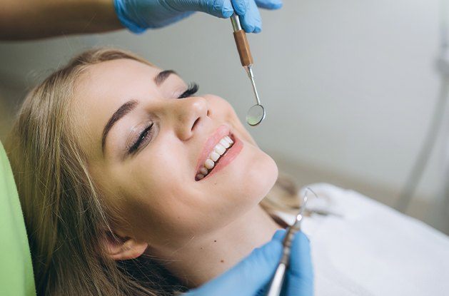 woman getting oral cancer screening